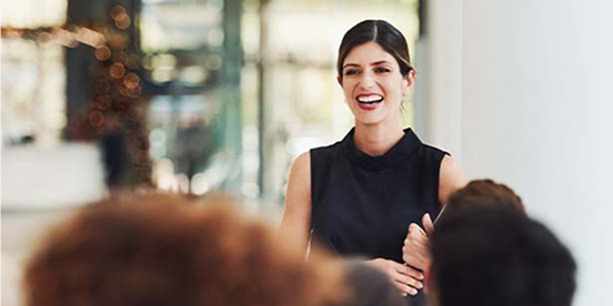Lady giving a meeting presentation